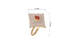 Elevate your ensemble with this striking geometric statement ring. Featuring a vibrant red center stone